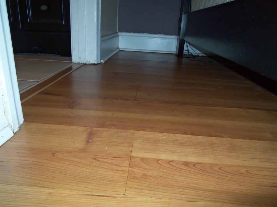 Water Damage Causes Wood Floors To Buckle